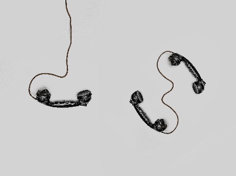 Phone left hanging. Photo by Alex Andrews Pexels - old school phones laying unattended